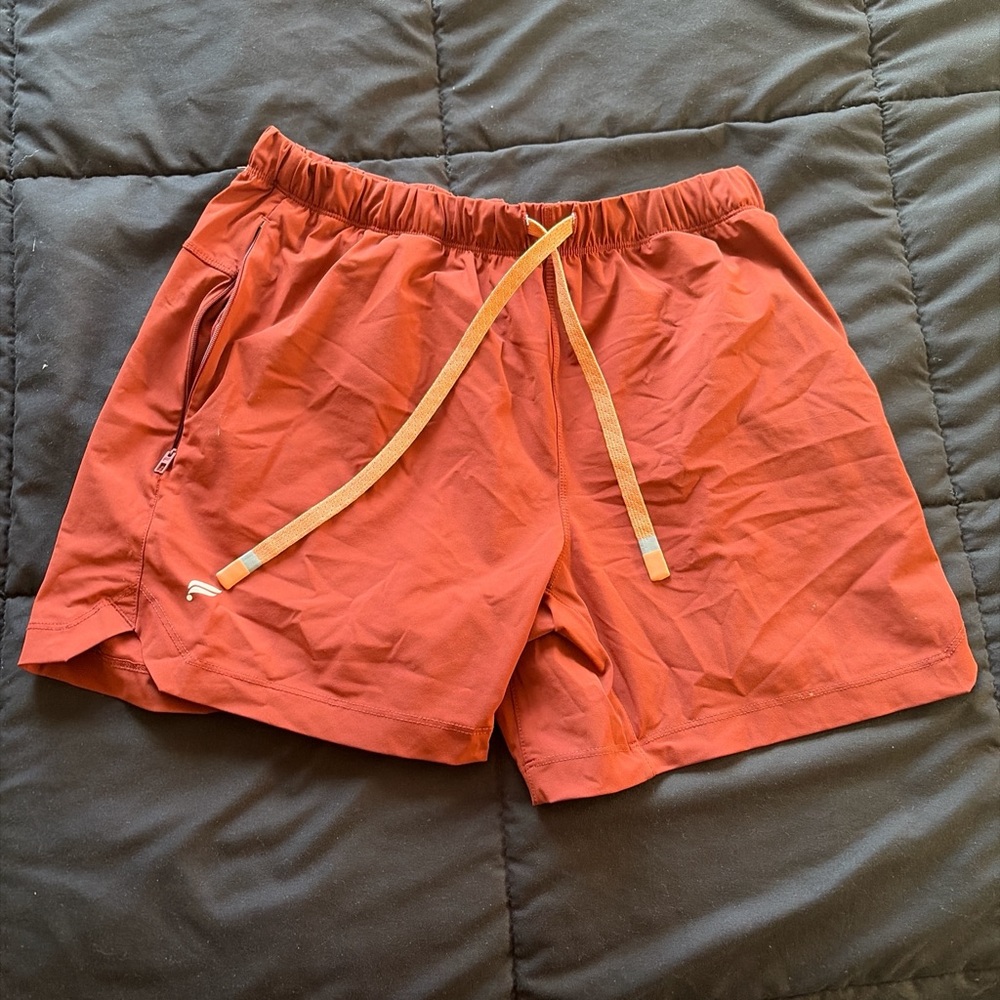 Fabletics Men's Athletic Shorts in Rust and Yellow